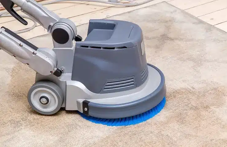 cleaning carpet with professional disk machine