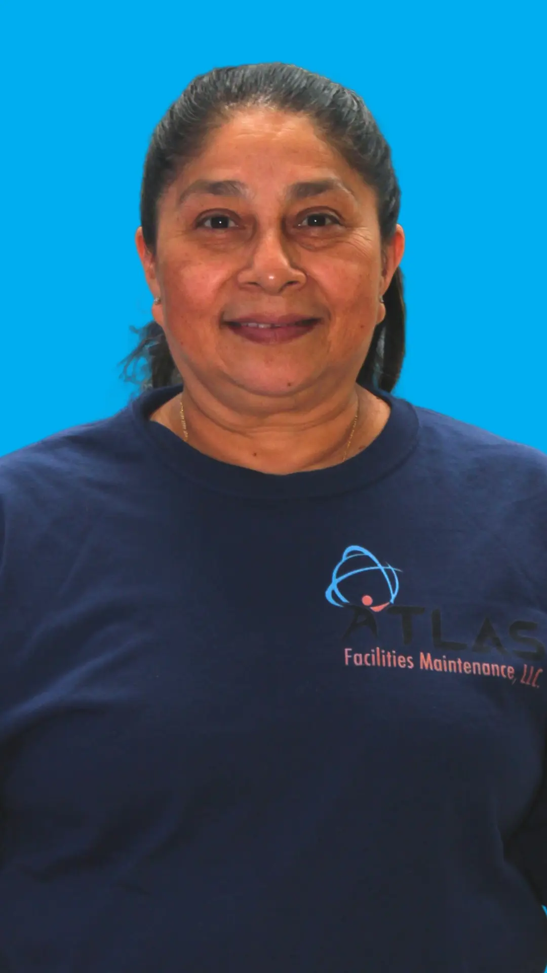 Commercial Cleaner wearing the new Atlas Facilities Maintenance Uniform