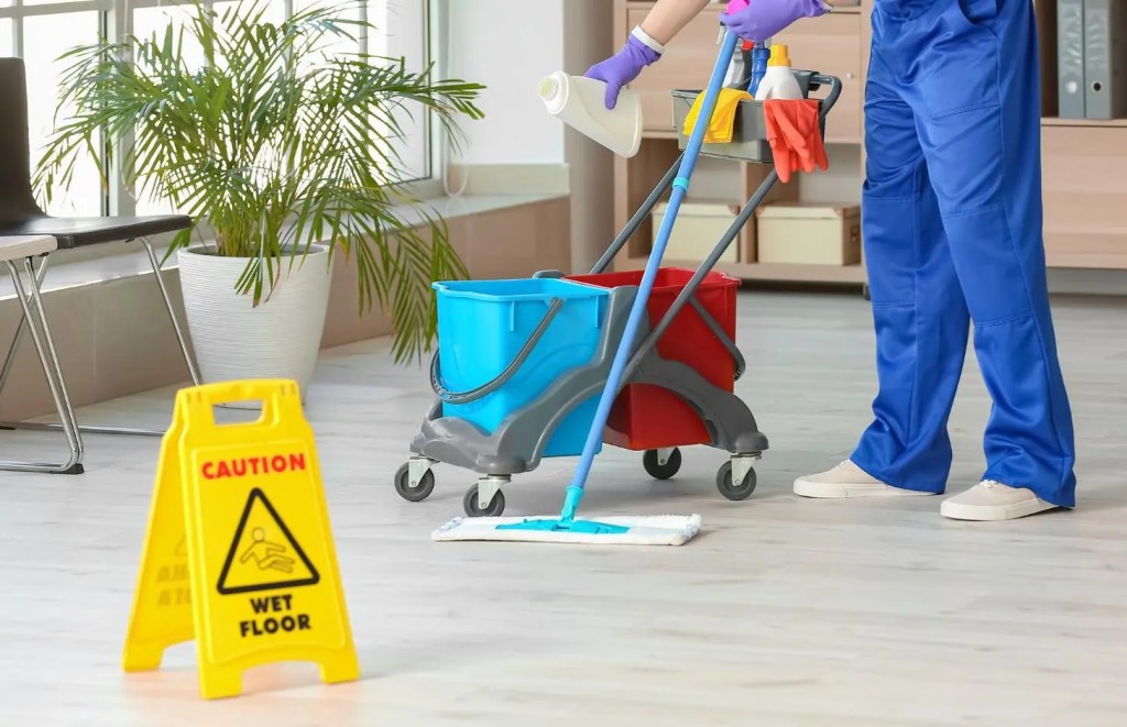 janitor cleaning the floor