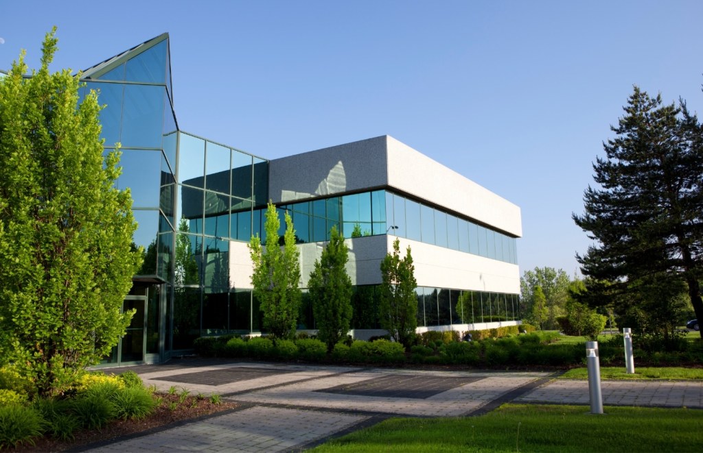 building with lush greenery