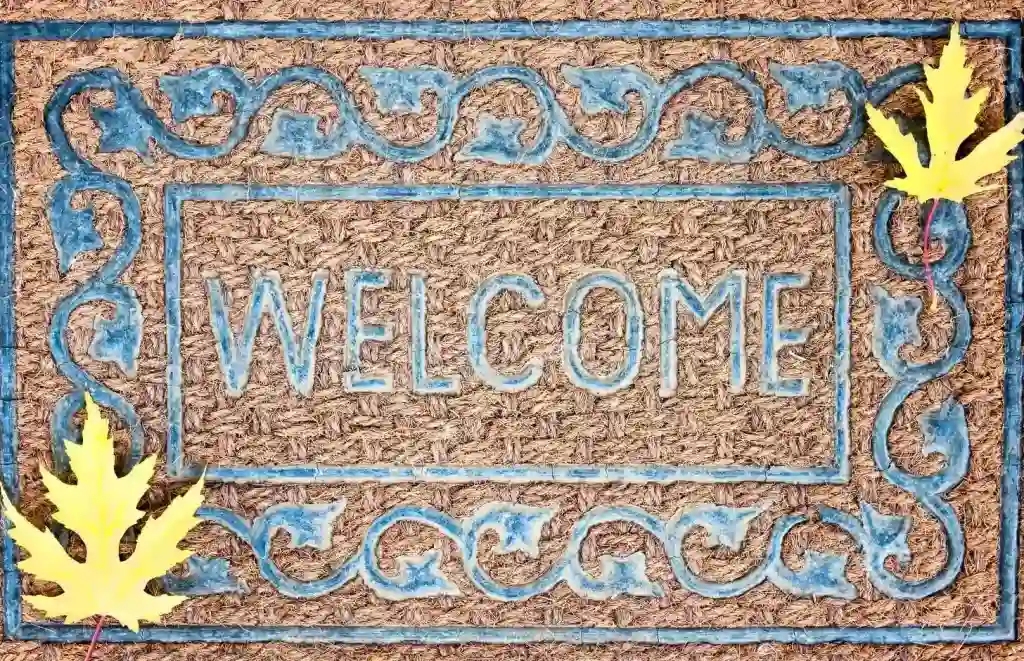 fall welcome mat with yellow maple leaves border