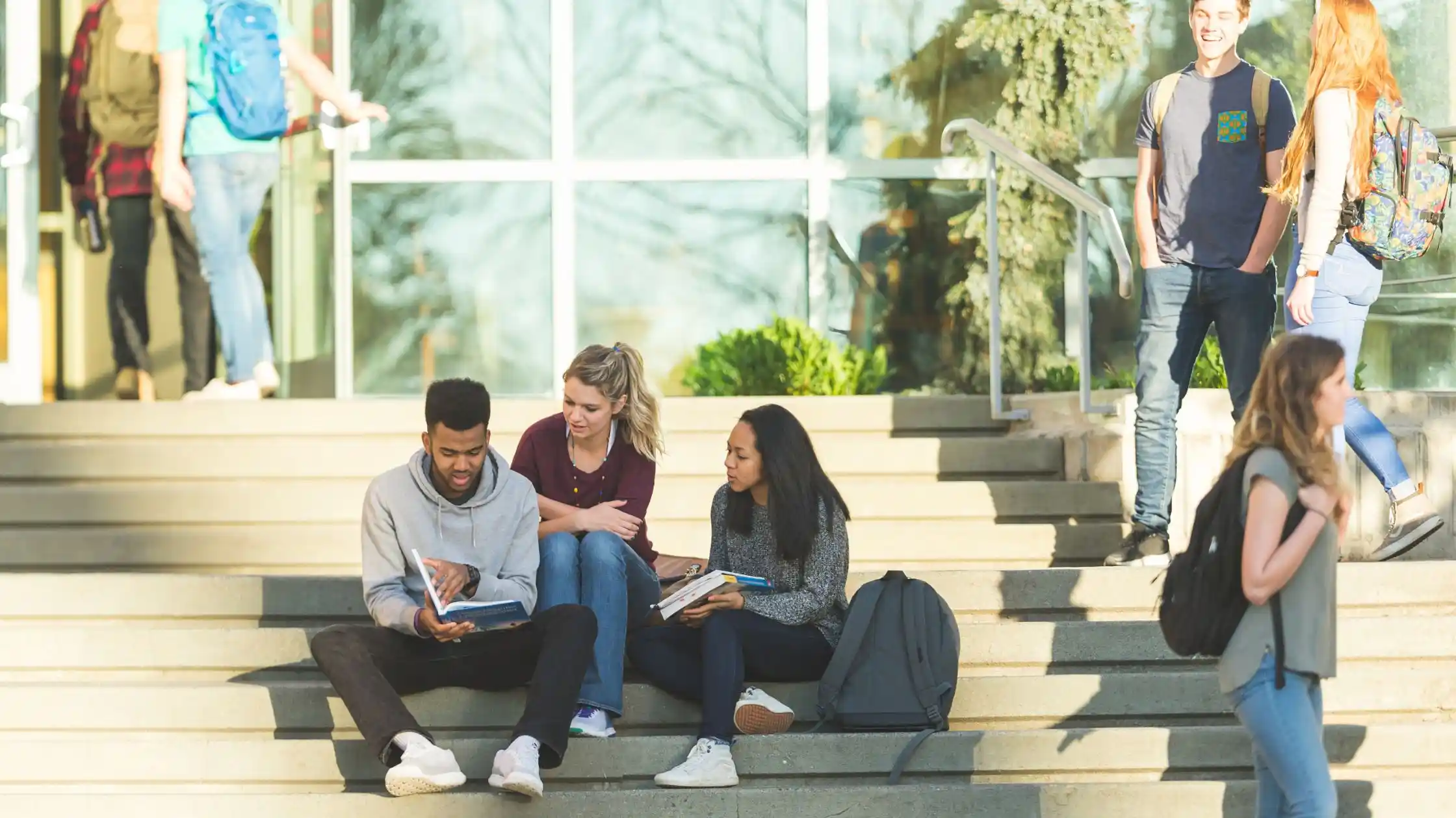 university students on the campus entrance