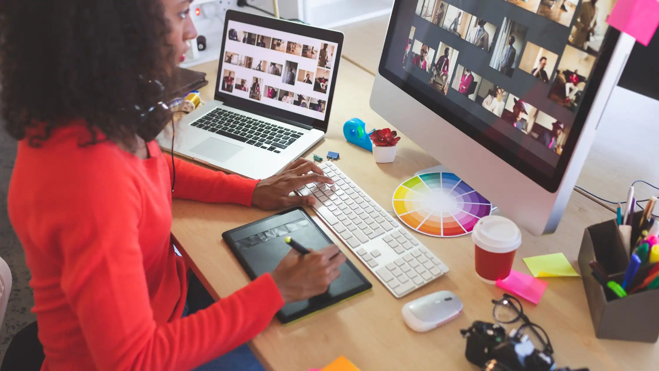 cluttered desk of a graphic designer